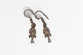 Pair of silver Ankh earrings on a white background